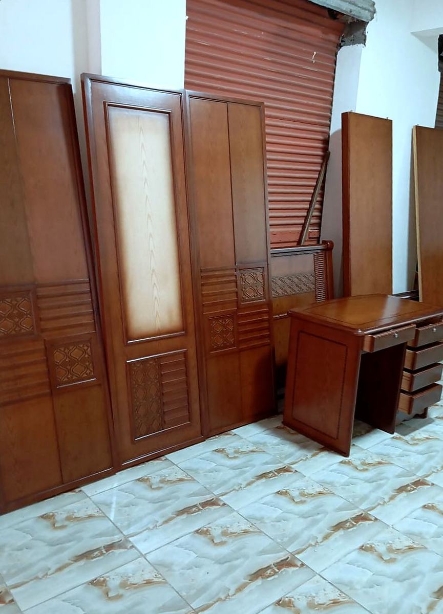 Doors and wardrobe fronts stacked in the joinery workshop