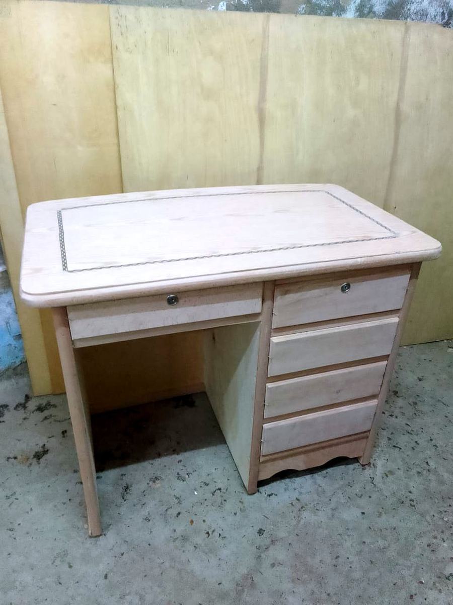 An unfinished desk in the joinery workshop