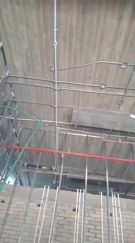 Ceiling first fix — electrical conduits above ceiling framing