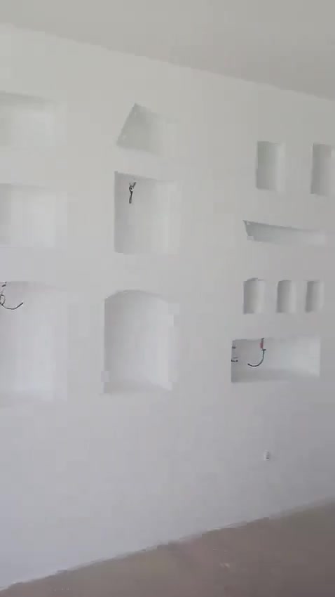 Sea-view living room with gypsum wall niches - paint stage